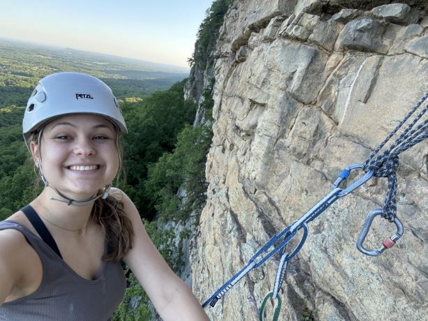 Student rock climbing