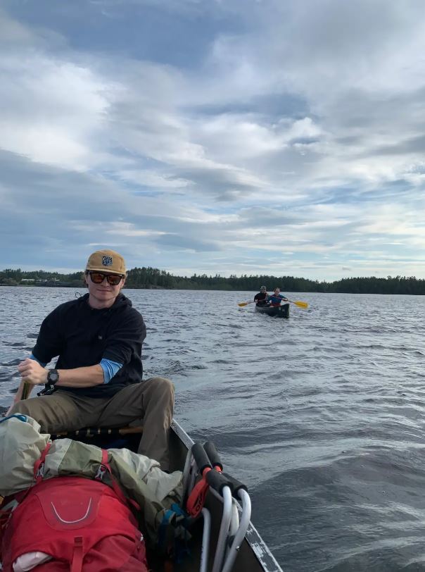 Jack Reed in boat on a lake.