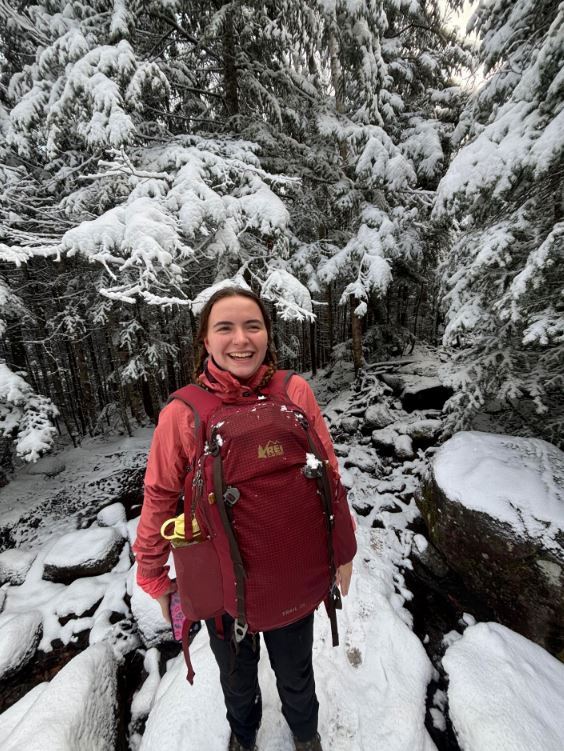 Girl hiking snow