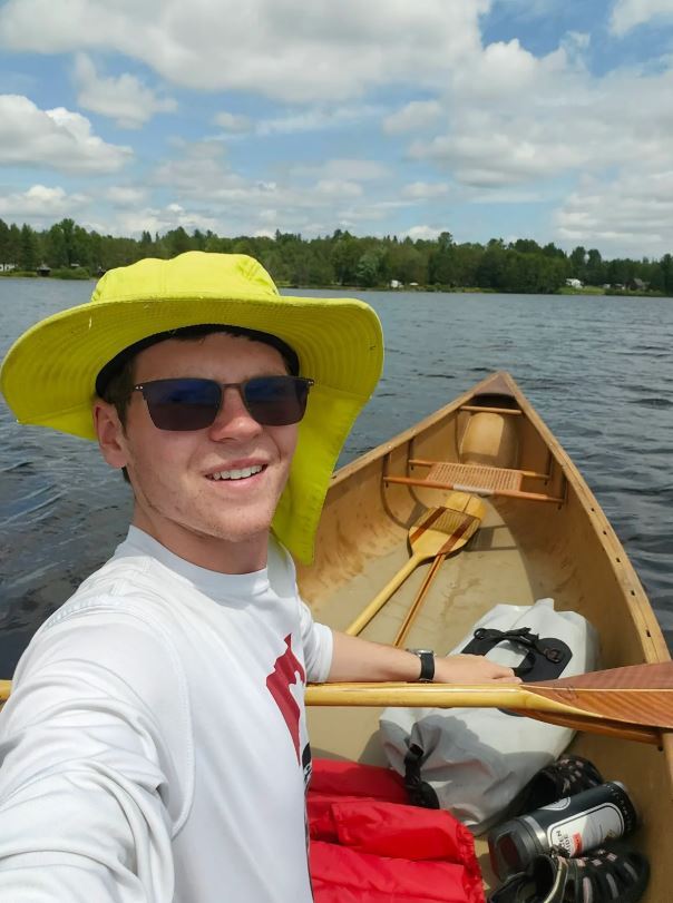 Tim Wilson in a canoe