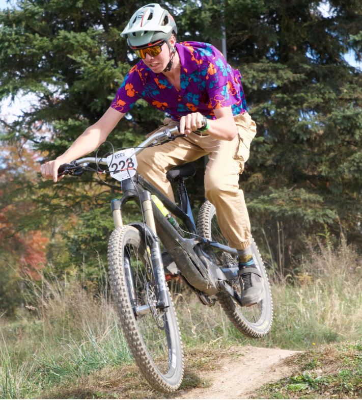 Male student on a mountain bike